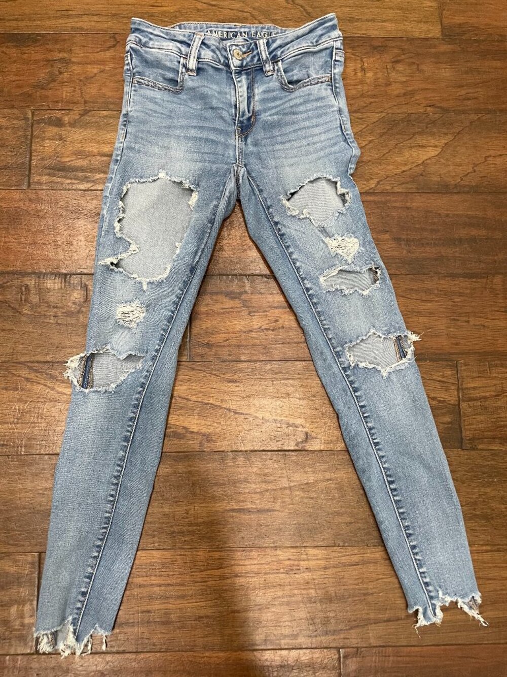 American Eagle Next Level Stretch Jegging Ripped Distressed Jeans Size 2 Raw Hem